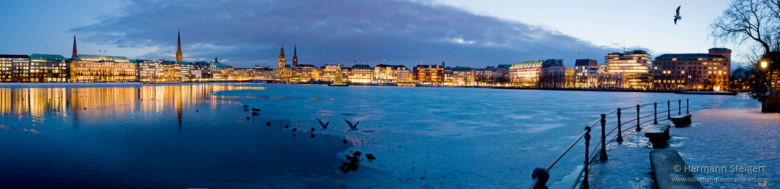 Abendliches Lichterspiel an der Binnenalster im Winter